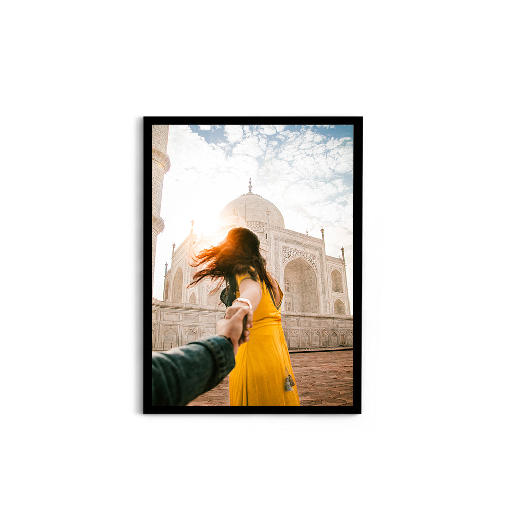 Woman holding hand in front of Taj Mahal - Taj Mahal