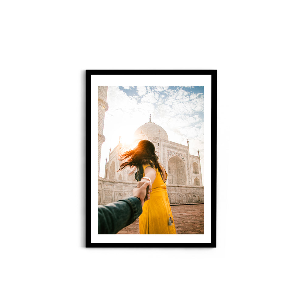 Woman holding hand in front of Taj Mahal - Taj Mahal