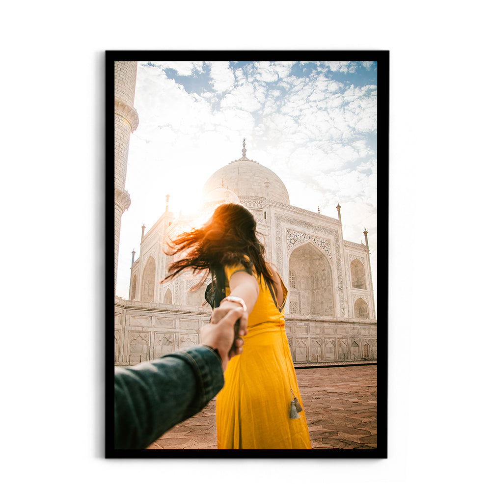 Woman holding hand in front of Taj Mahal - Taj Mahal