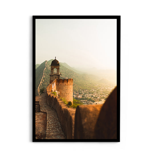 Thoughtful man sitting on a mountain enjoying the view - Jaipur