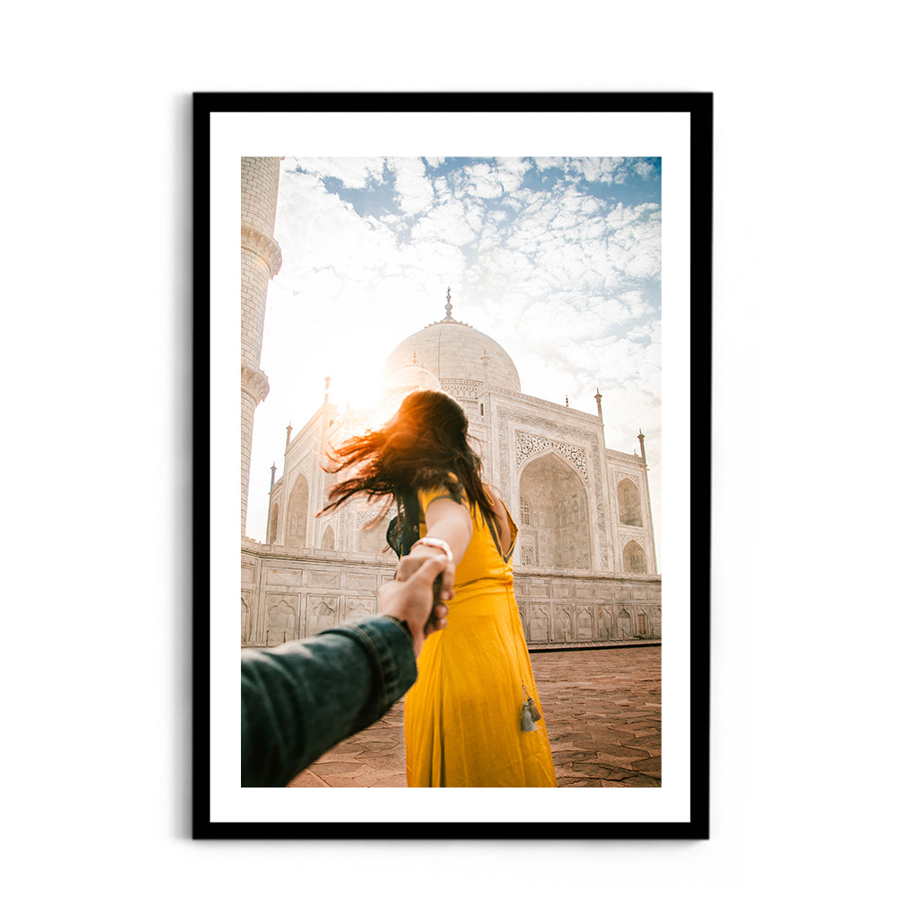Woman holding hand in front of Taj Mahal - Taj Mahal