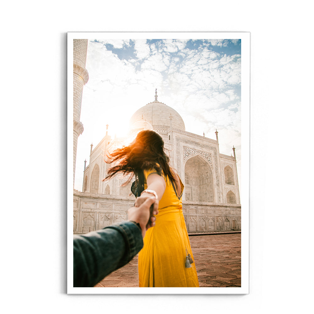 Woman holding hand in front of Taj Mahal - Taj Mahal