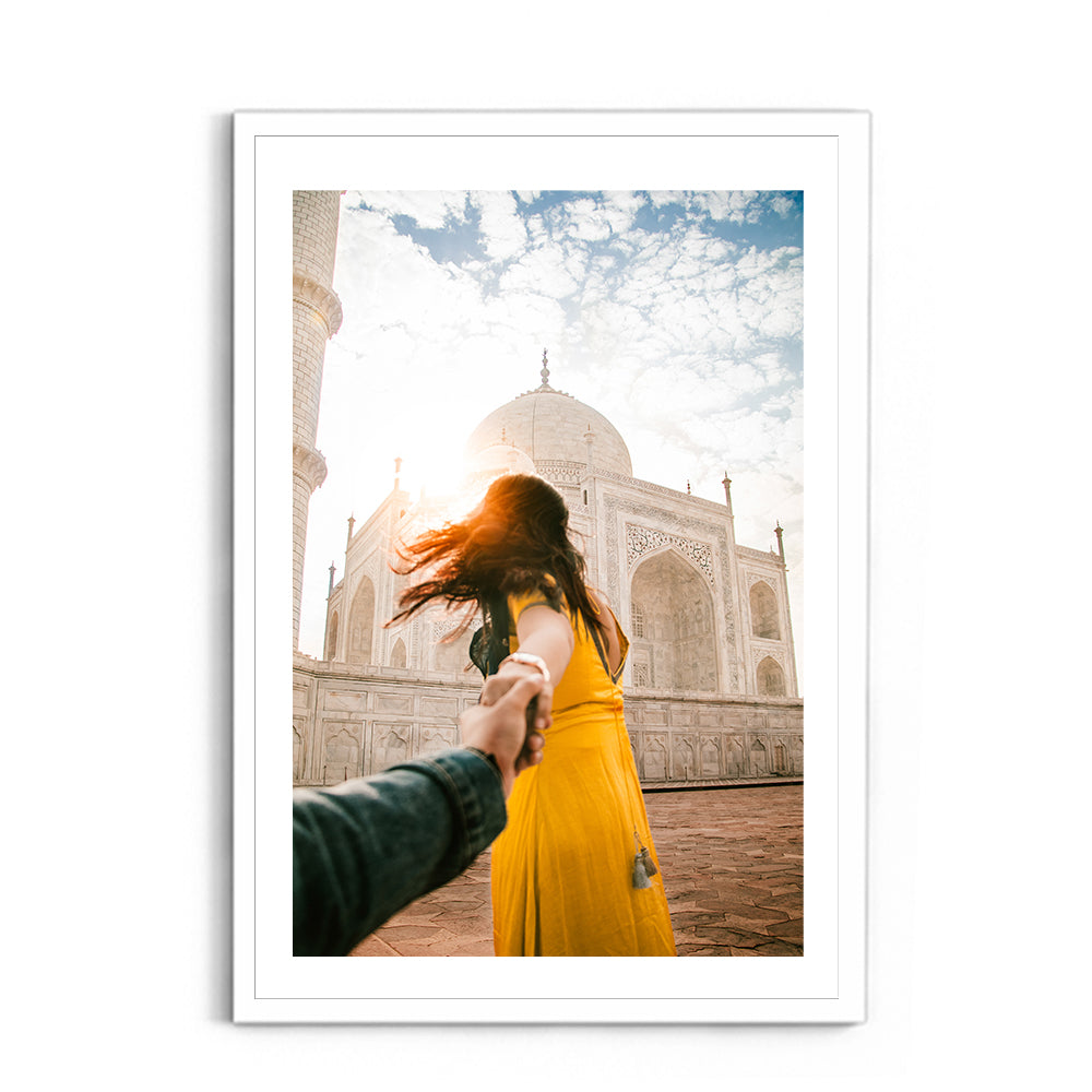 Woman holding hand in front of Taj Mahal - Taj Mahal
